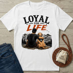 White crew neck t-shirt featuring a graphic of a man and his dog overlooking mountains with the text Loyal For Life.