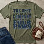 Olive green vintage-style t-shirt with navy blue text reading The Best Kind of Company Has Four Paws on a wooden surface.