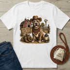 White crew neck t-shirt featuring a western-style graphic of a dog in a cowboy hat and bandana in front of a rustic barn.