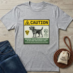 Light grey Gildan Softstyle® t-shirt with a "Biological Vacuum" dog graphic, beside jeans and dog treats.