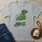 Light grey Gildan Softstyle® t-shirt with a green, floral dog graphic and "Bloom Where You Are Rescued" banner.