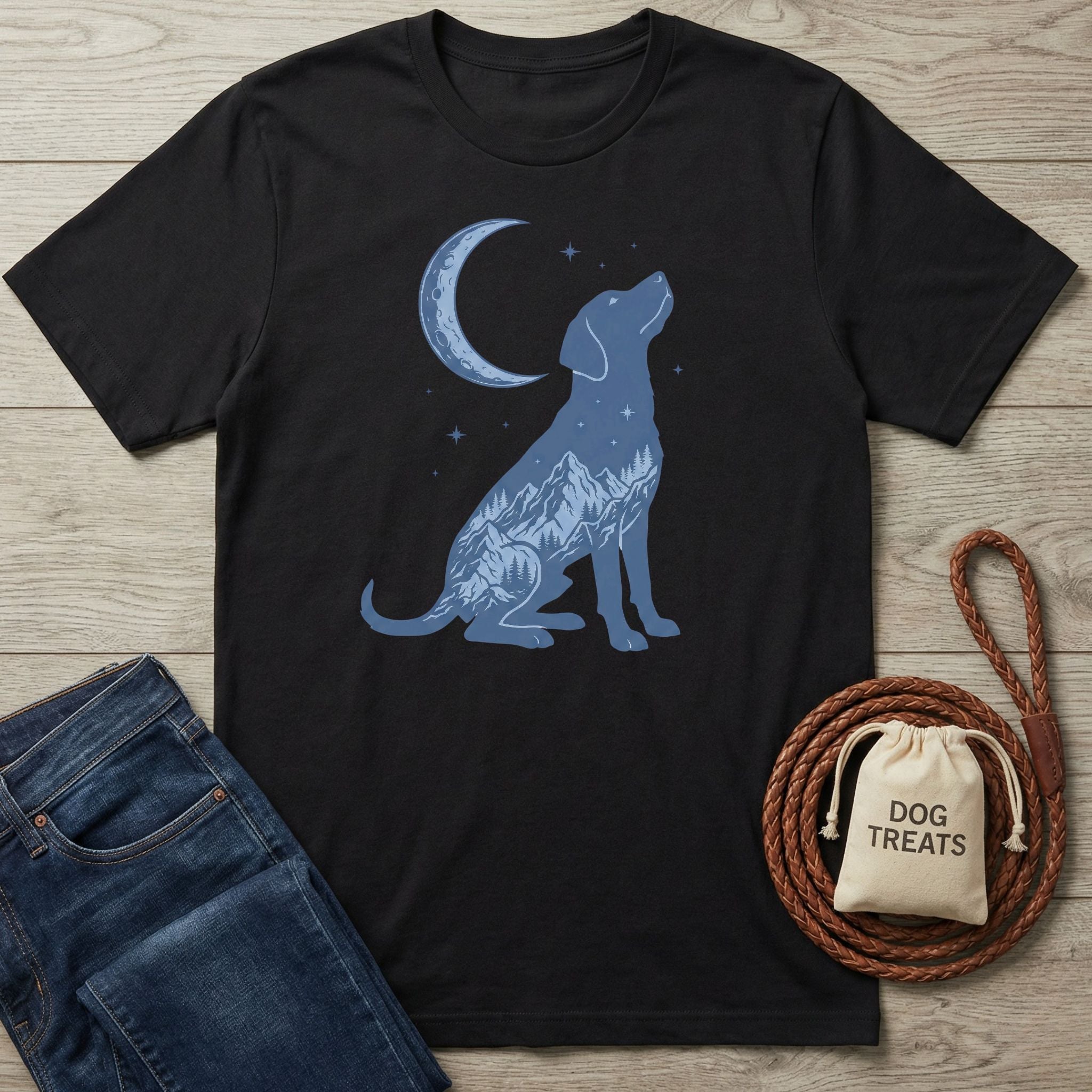Black t-shirt with a blue moon and dog silhouette filled with mountain scenery.