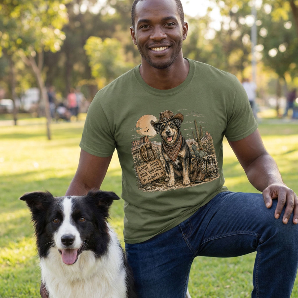 Olive green crewneck t-shirt featuring a western-style graphic of a dog in a cowboy hat with the text Good Dogs Ride Shotgun.