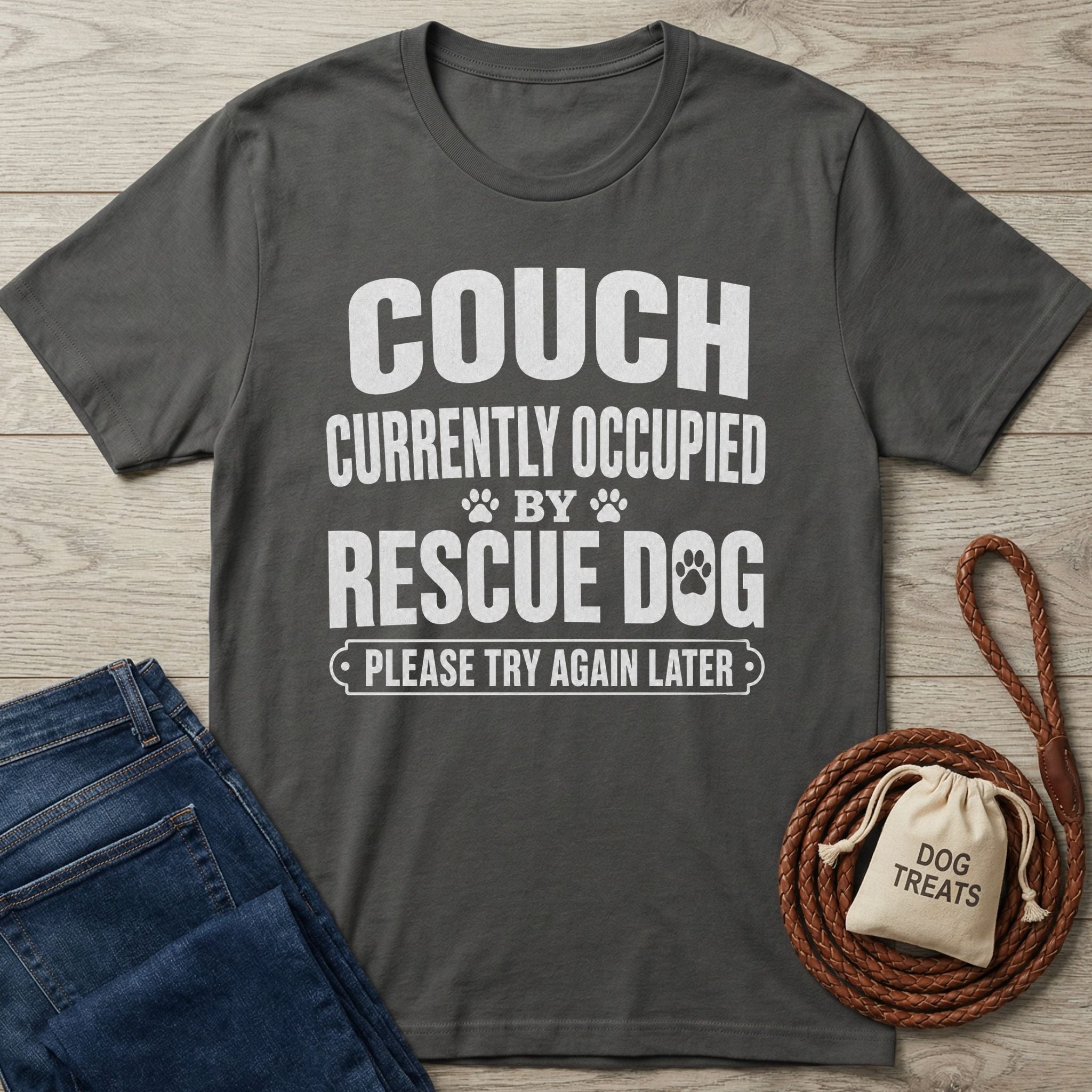 Dark grey Gildan Softstyle t-shirt with "THE COUCH IS CURRENTLY OCCUPIED BY A RESCUE DOG..." text.