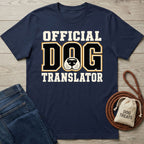 Navy blue crewneck t-shirt with Official Dog Translator text and a dog nose graphic, displayed with jeans and a treat bag.