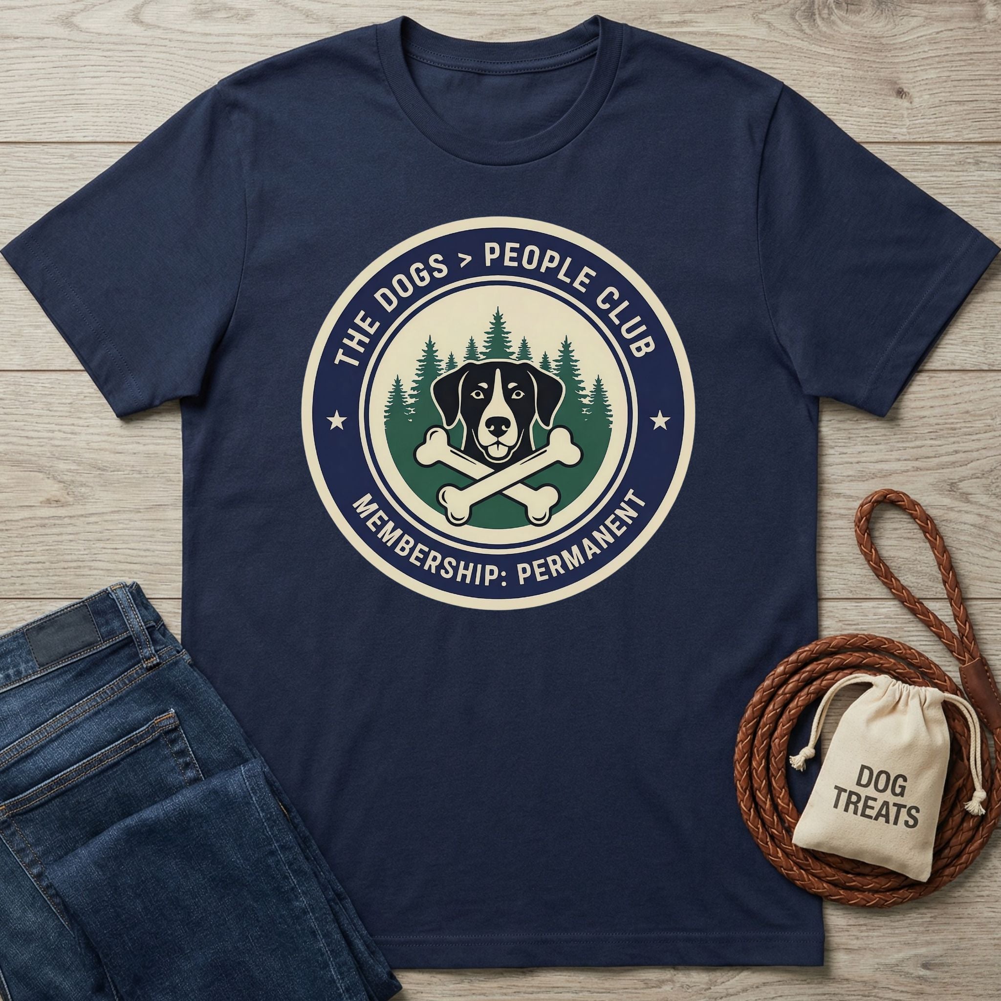 Navy blue Gildan Softstyle t-shirt with "The Dogs > People Club" logo, dog, bones, and trees.