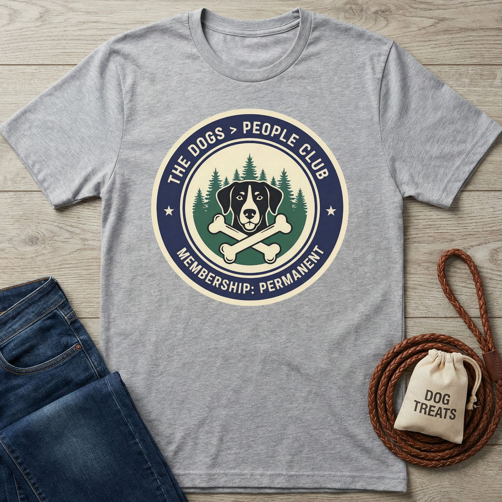 Light grey Gildan Softstyle t-shirt with "The Dogs > People Club" graphic, jeans, and dog accessories.