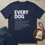Navy blue cotton t-shirt featuring a white dictionary-style definition of Every Dog, laid on a wooden surface with dog accessories.