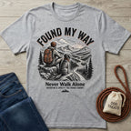 Light grey Gildan Softstyle t-shirt with "Found My Way" graphic featuring a person and dog hiking.