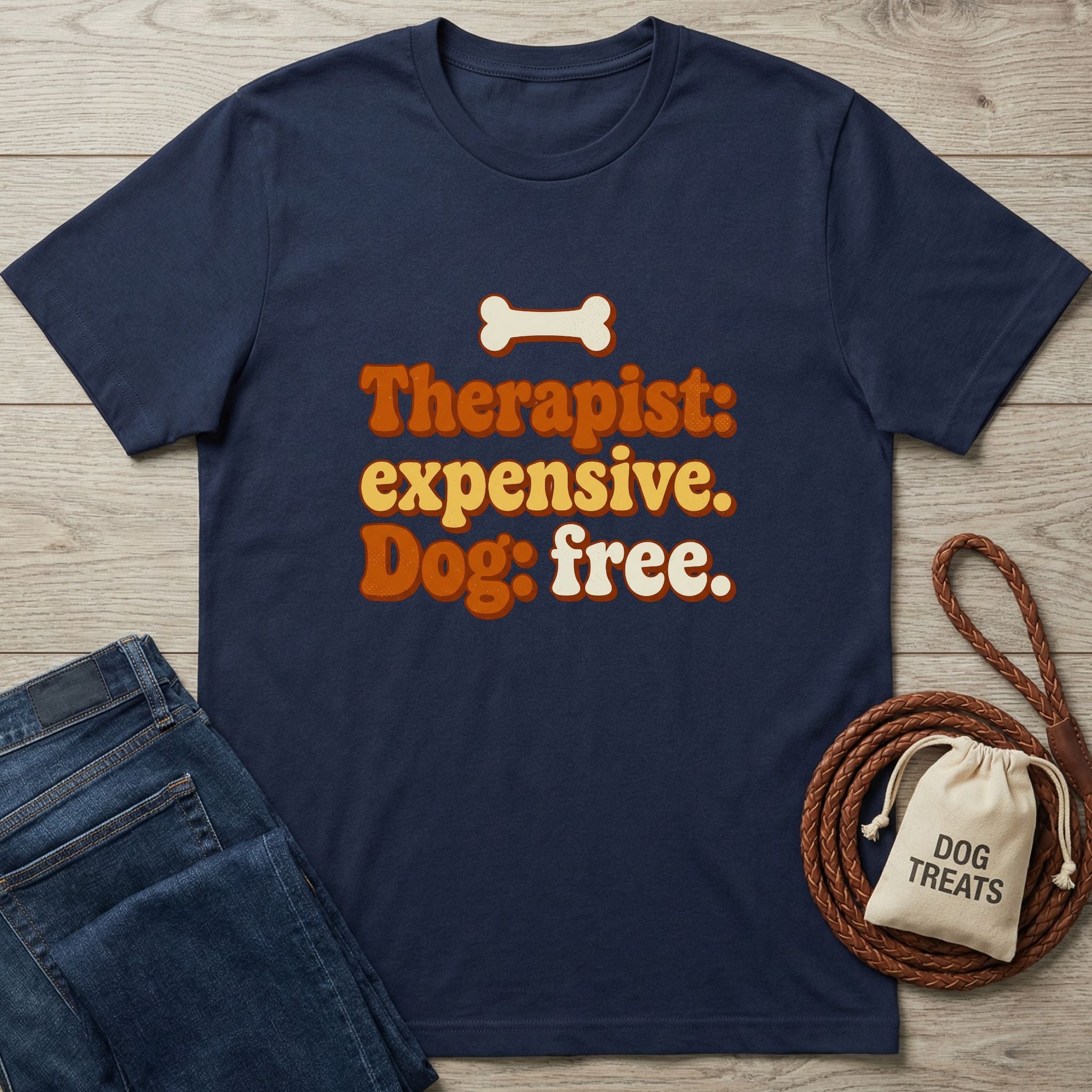 Navy blue Gildan Softstyle® t-shirt with "Therapist: expensive. Dog: free." text and a bone graphic.