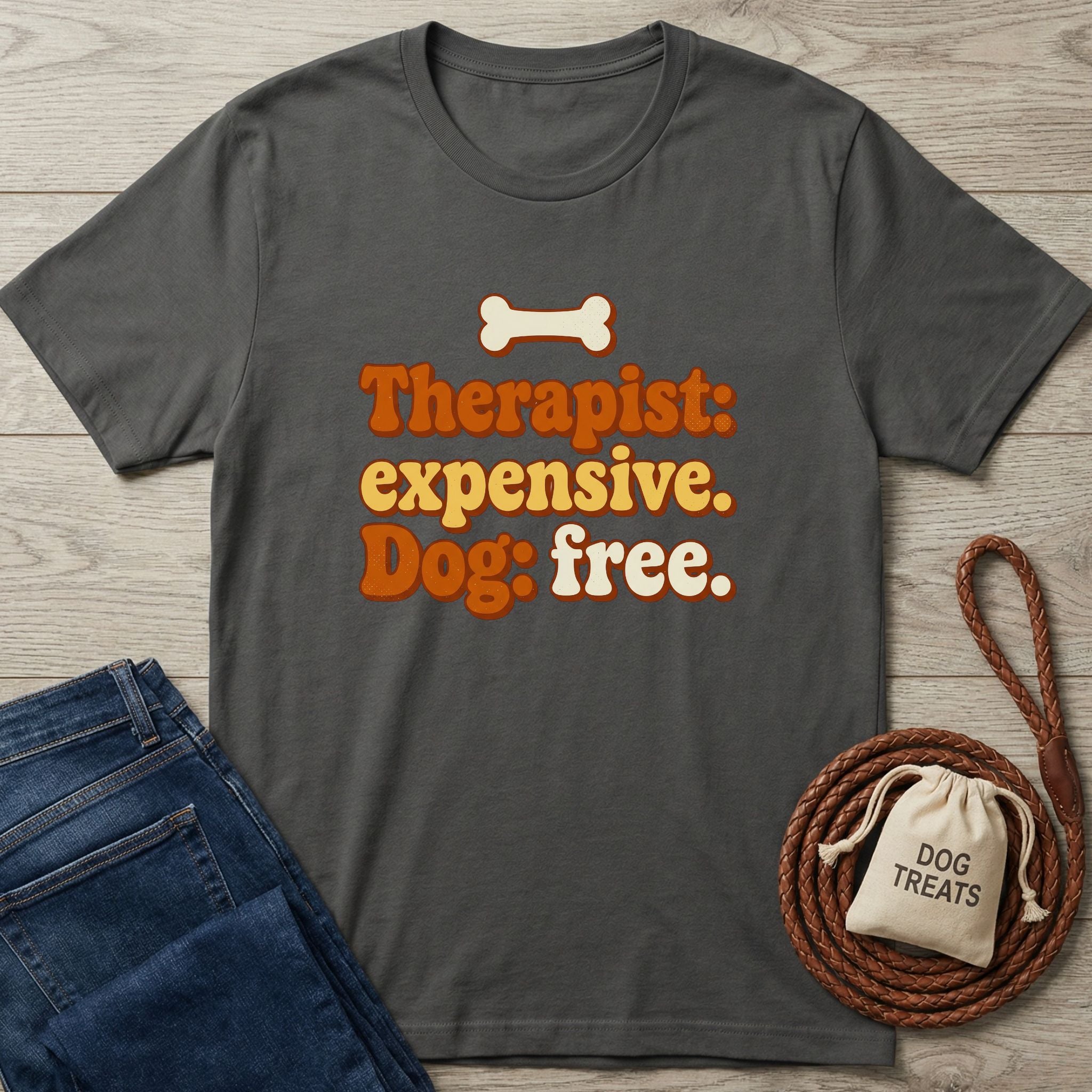 Dark grey Gildan Softstyle t-shirt with "Therapist: expensive. Dog: free." text and a bone graphic.