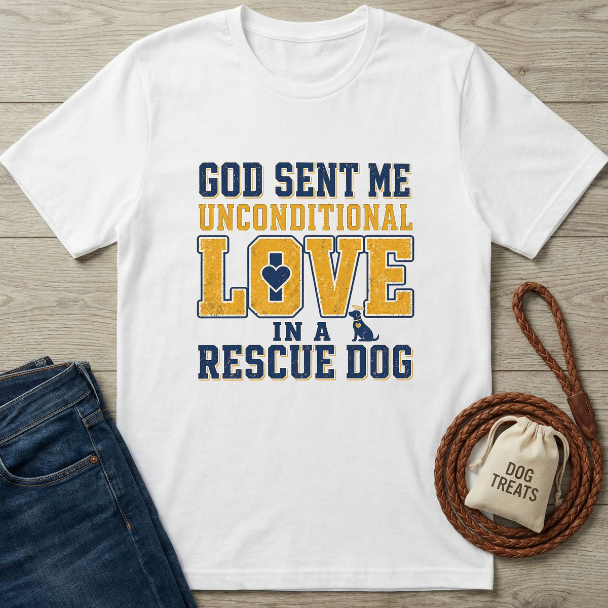 White Gildan Softstyle® t-shirt with "God Sent Me Unconditional Love In A Rescue Dog" graphic in blue and distressed yellow.