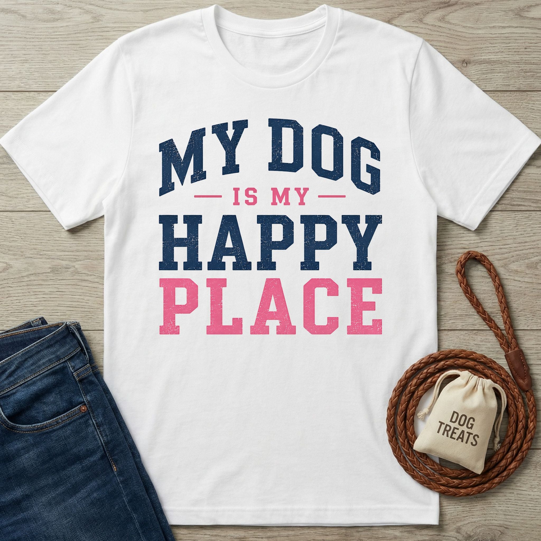 White crew neck t-shirt with navy and pink My Dog Is My Happy Place text, styled with a leather leash and treat bag.