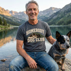 Man wearing a charcoal grey vintage-style Homebody Dog Club graphic t-shirt featuring a sleeping dog illustration.