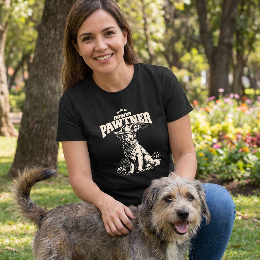 Woman wearing a black crewneck t-shirt featuring a white western-style graphic of a dog wearing a cowboy hat.