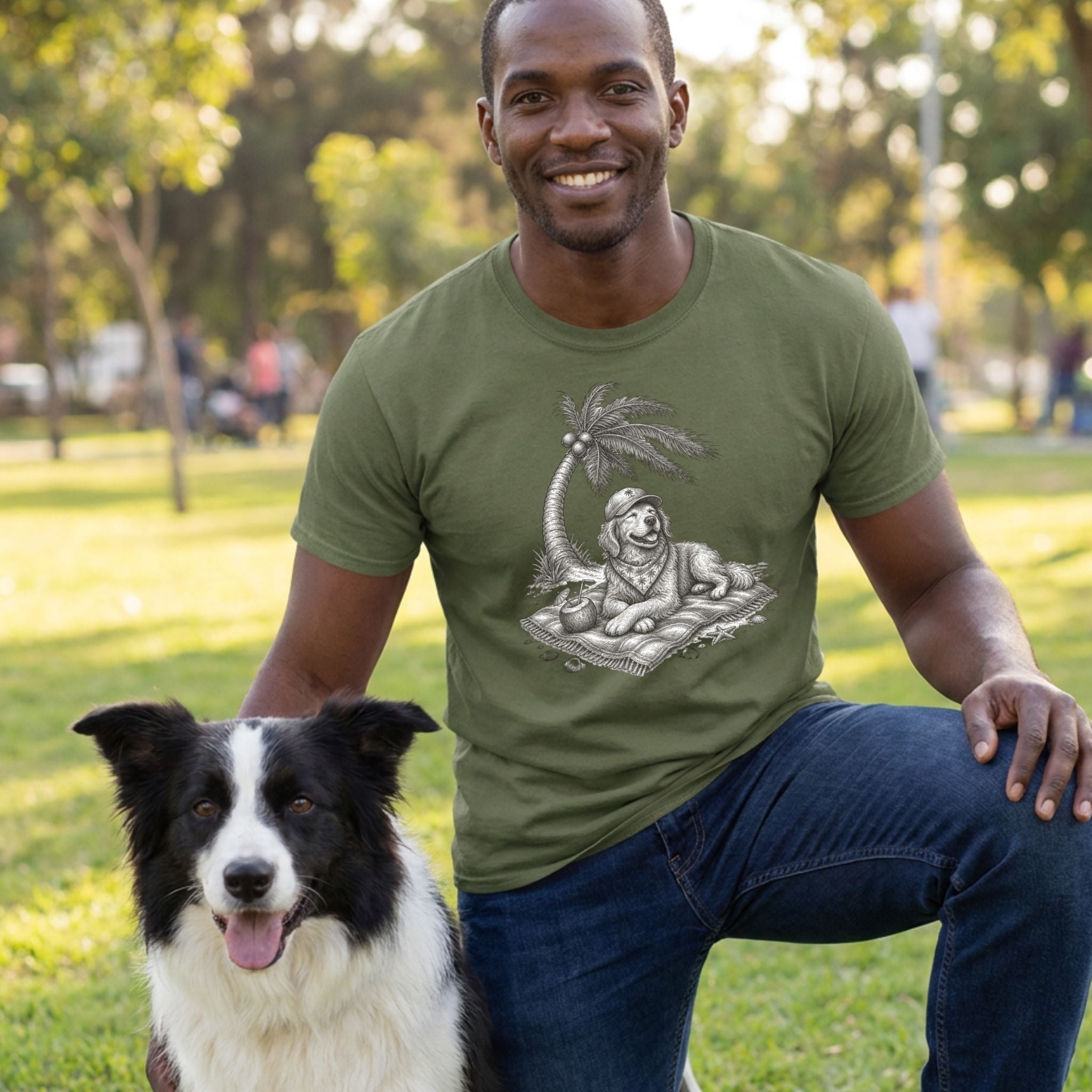 Man wearing an olive green crewneck t-shirt featuring a graphic of a dog relaxing on a beach under a palm tree.