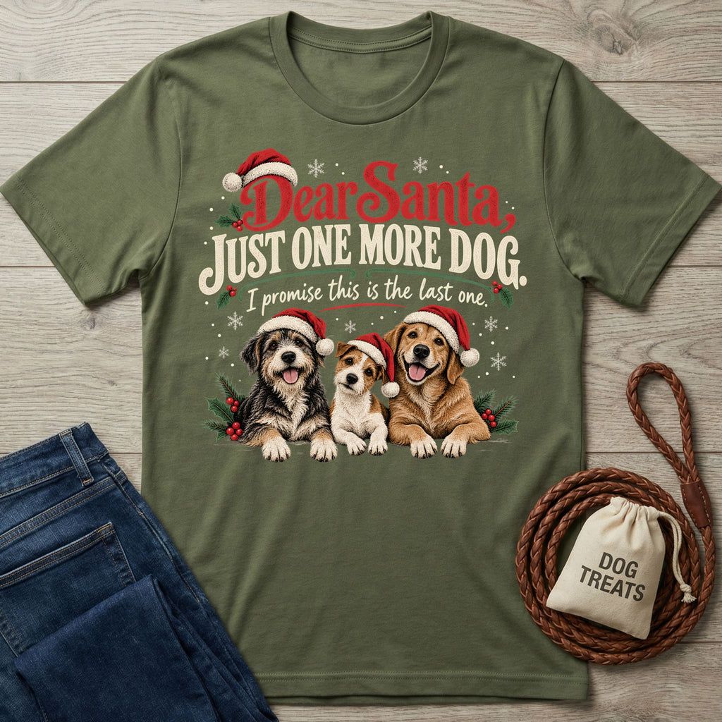 Olive green crewneck T-shirt featuring three dogs in Santa hats with the text Dear Santa, Just One More Dog.