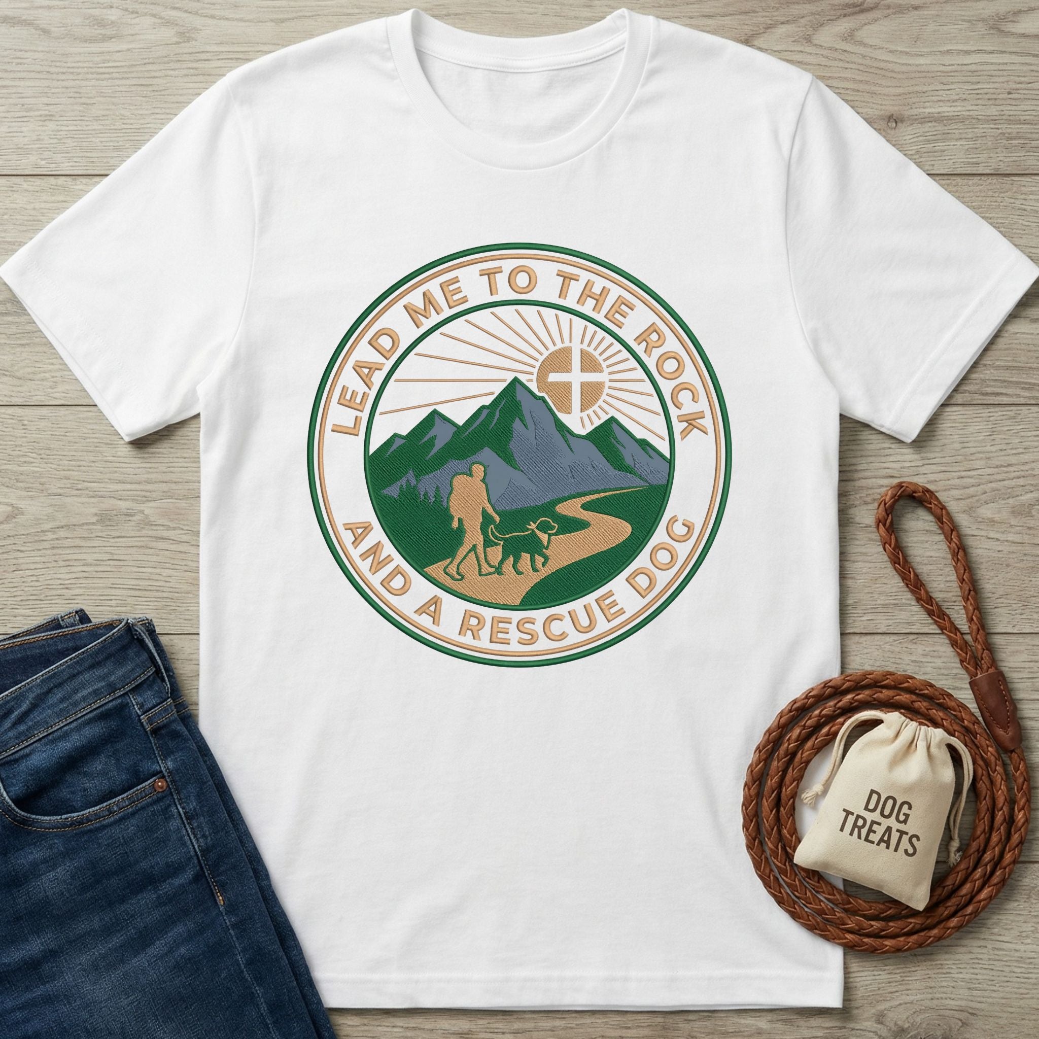 White Gildan Softstyle® 64000 t-shirt with "Lead Me To The Rock And A Rescue Dog" graphic, jeans, and dog treats.