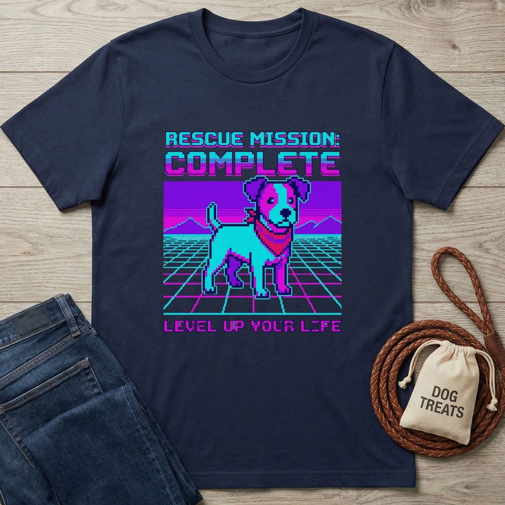 Navy blue Gildan Softstyle t-shirt with a retro pixel art rescue dog design and "Rescue Mission: Complete" text.