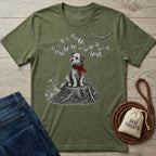 Olive green cotton t-shirt featuring a black and white illustration of a scruffy dog in a red bandana sitting on a stump.