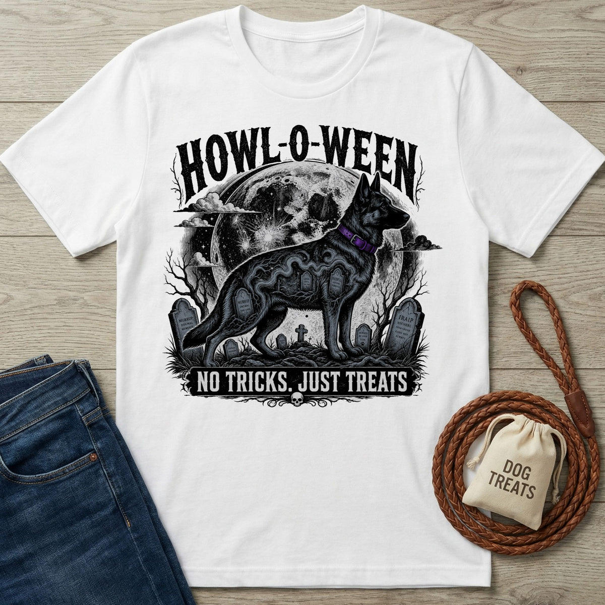 White crewneck t-shirt featuring a black German Shepherd, full moon, and graveyard graphic with the text Howl-o-ween and No Tricks.