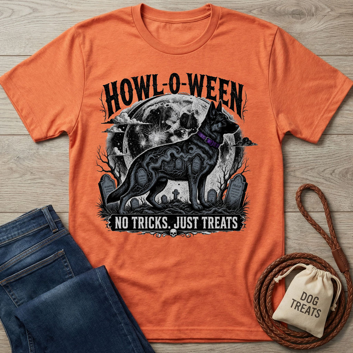 Orange crewneck t-shirt featuring a spooky Howl-O-Ween graphic with a black dog, full moon, and tombstones.