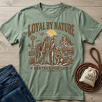 Sage green crewneck t-shirt featuring a western graphic of a cowboy, horse, and dog with Loyal By Nature text.