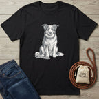 Black cotton t-shirt featuring a detailed white illustration of a dog sitting patiently with a rope toy.
