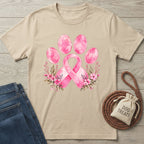 Beige crewneck T-shirt featuring a watercolor pink ribbon and paw print design with delicate floral accents.