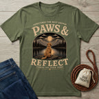 Olive green crewneck t-shirt featuring a Golden Retriever graphic overlooking a moonlit mountain lake with Paws & Reflect text.