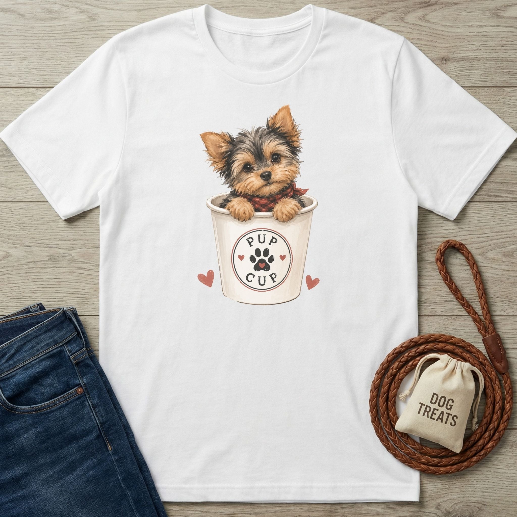 White cotton t-shirt featuring a cute Yorkshire Terrier in a Pup Cup graphic with red hearts on a wooden background.