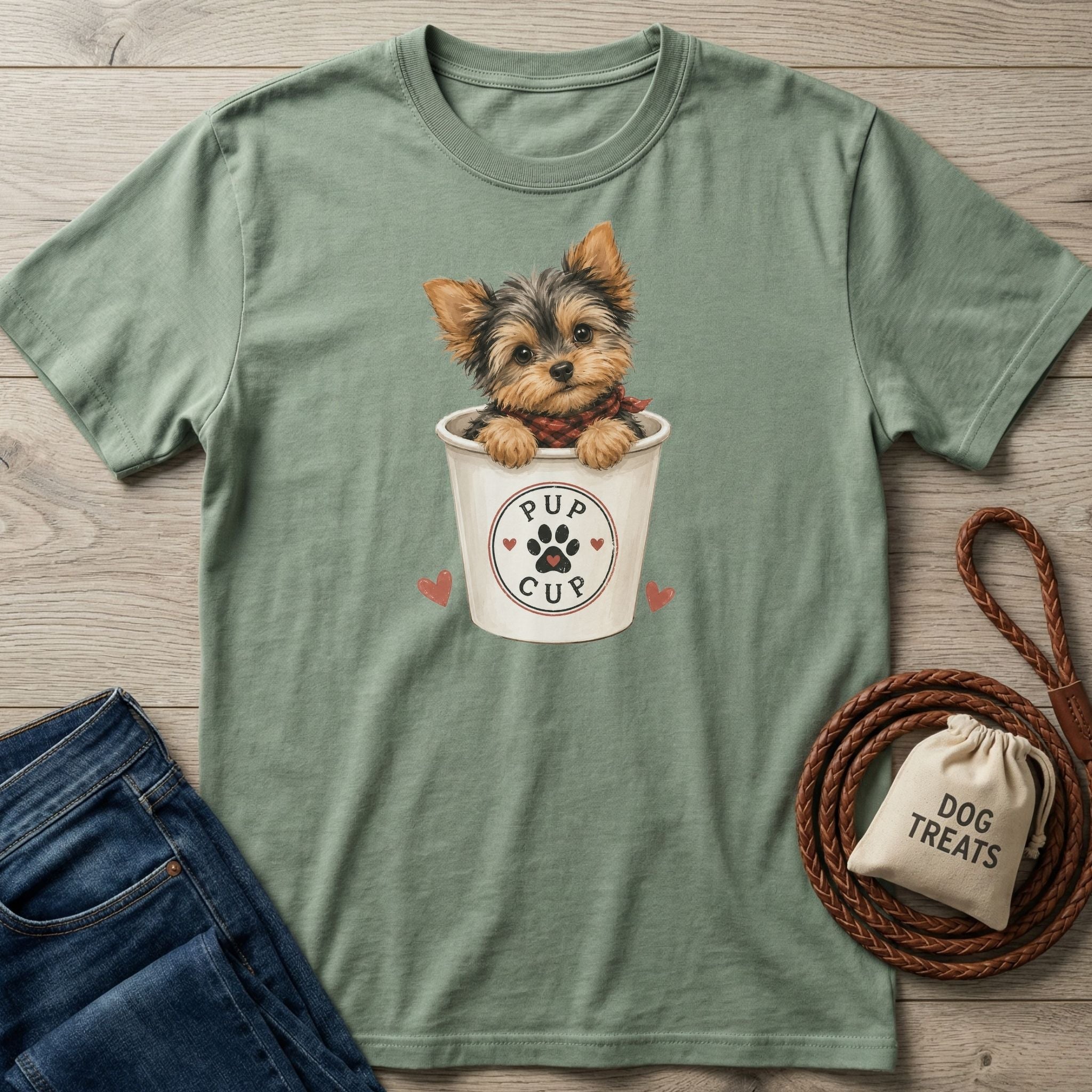 Sage green crewneck t-shirt featuring a cute Yorkshire Terrier inside a Pup Cup graphic with paw print and heart details.