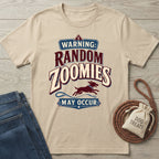 Beige crewneck t-shirt featuring a vintage-style graphic of a running dog with the text Warning: Random Zoomies May Occur.