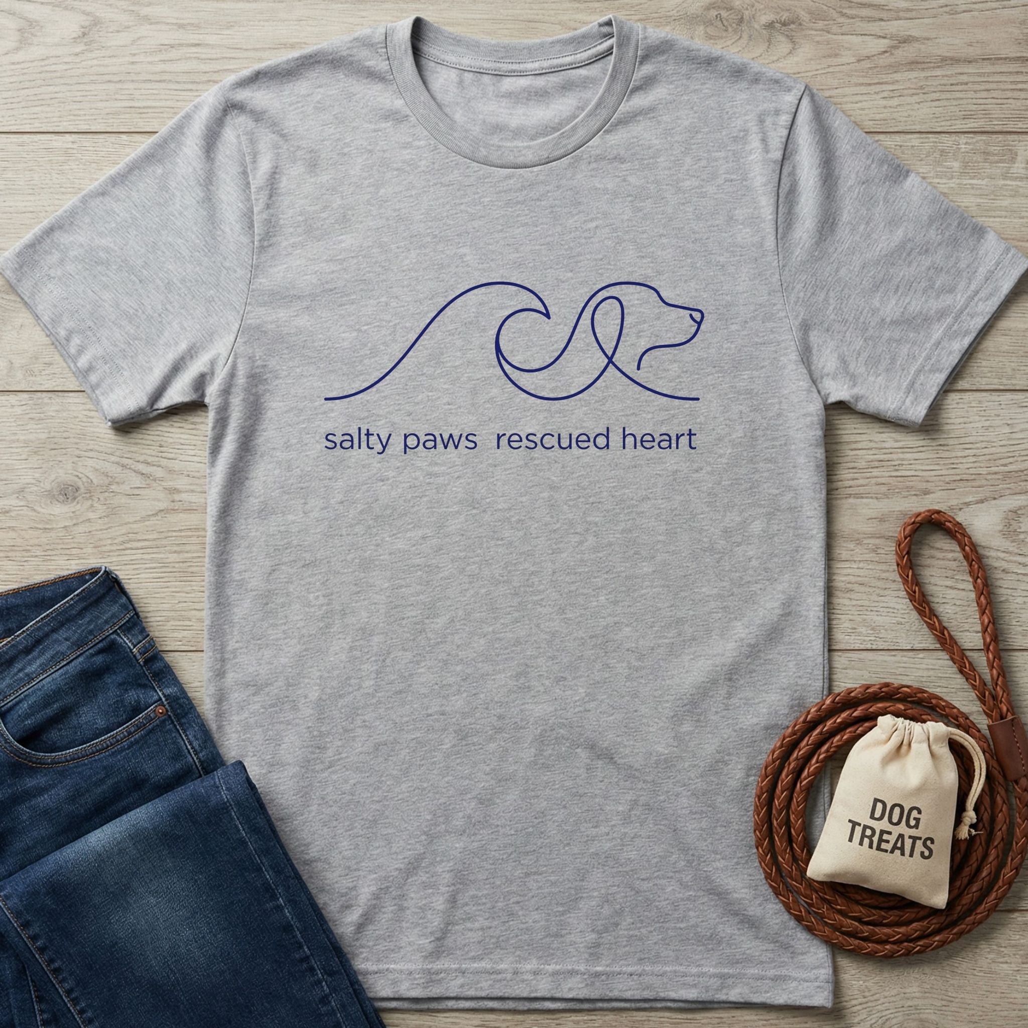 Heather grey Salty Paws Rescued Heart t-shirt with a navy dog and wave graphic.
