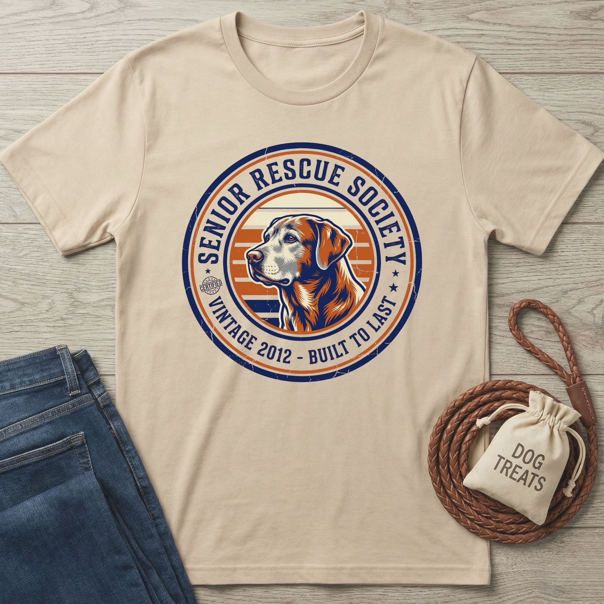 Cream Gildan Softstyle t-shirt with a "Senior Rescue Society" logo featuring a dog's profile.