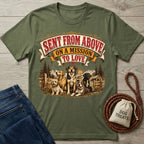Olive green crewneck t-shirt featuring a vintage-style graphic of four dogs with the text Sent From Above On A Mission To Love.