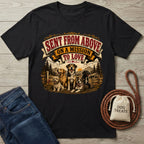 Black crewneck t-shirt featuring a vintage-style graphic of five dogs in a field with the text Sent From Above On A Mission To Love.