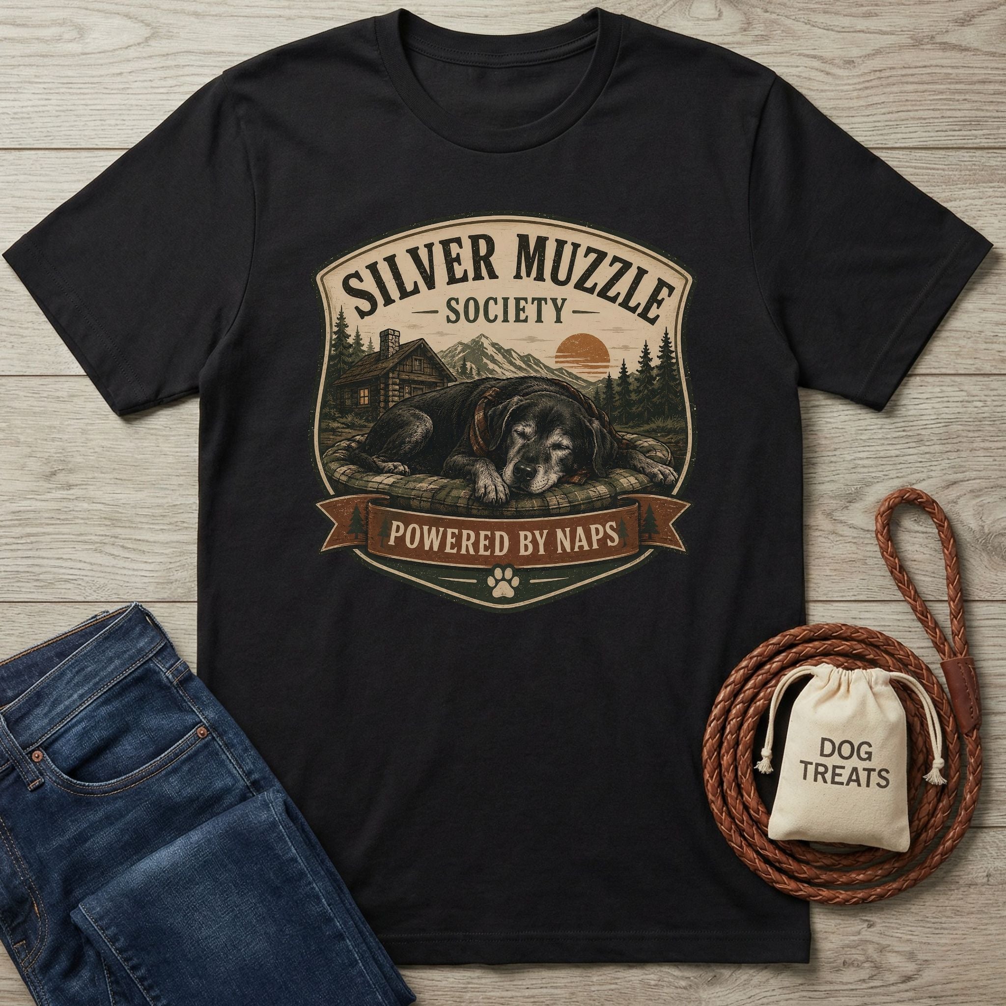 Black cotton t-shirt with "Silver Muzzle Society - Powered by Naps" graphic featuring a sleeping senior dog.