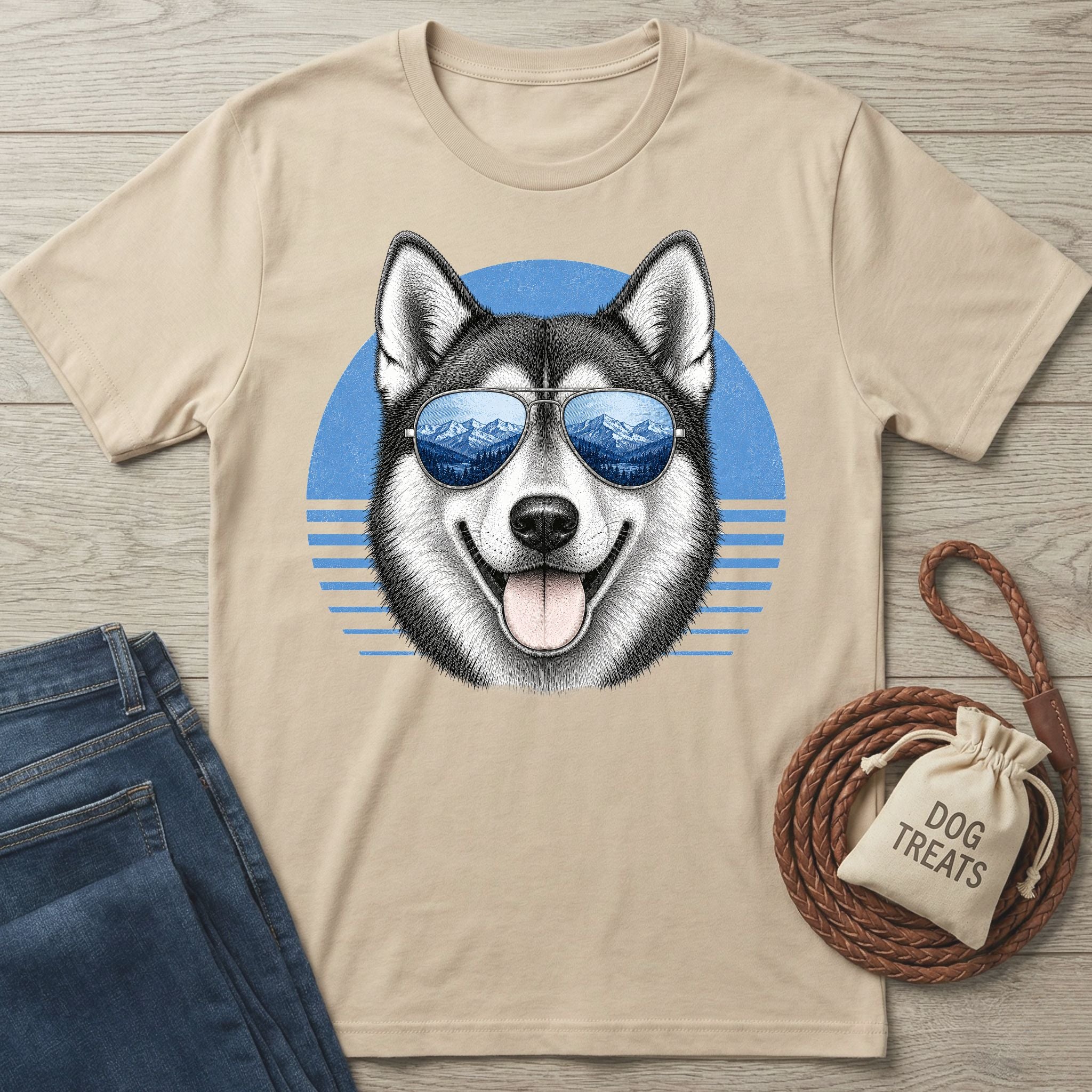 Beige crewneck t-shirt featuring a husky wearing mountain-reflecting sunglasses against a blue circular graphic.