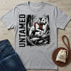 Grey crewneck t-shirt featuring a graphic of a dog jumping over a log with the word Untamed in bold black text.